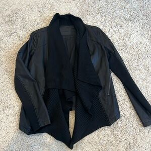 Leather jacket with sweater detailing